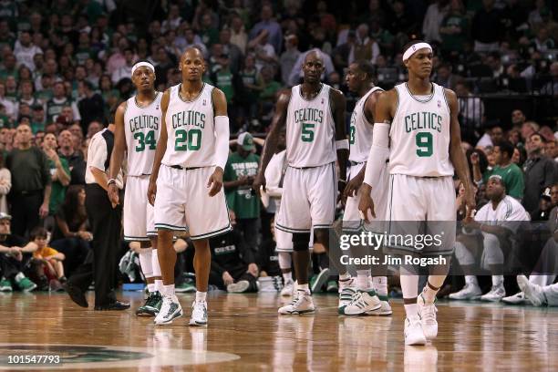 Paul Pierce, Ray Allen, Kevin Garnett and Rajon Rondo of the Boston Celtics look on against the Orlando Magic in Game Six of the Eastern Conference...