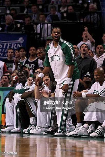 Sheldon Williams of the Boston Celtics supports his teammates from the bench against the Orlando Magic in Game Six of the Eastern Conference Finals...