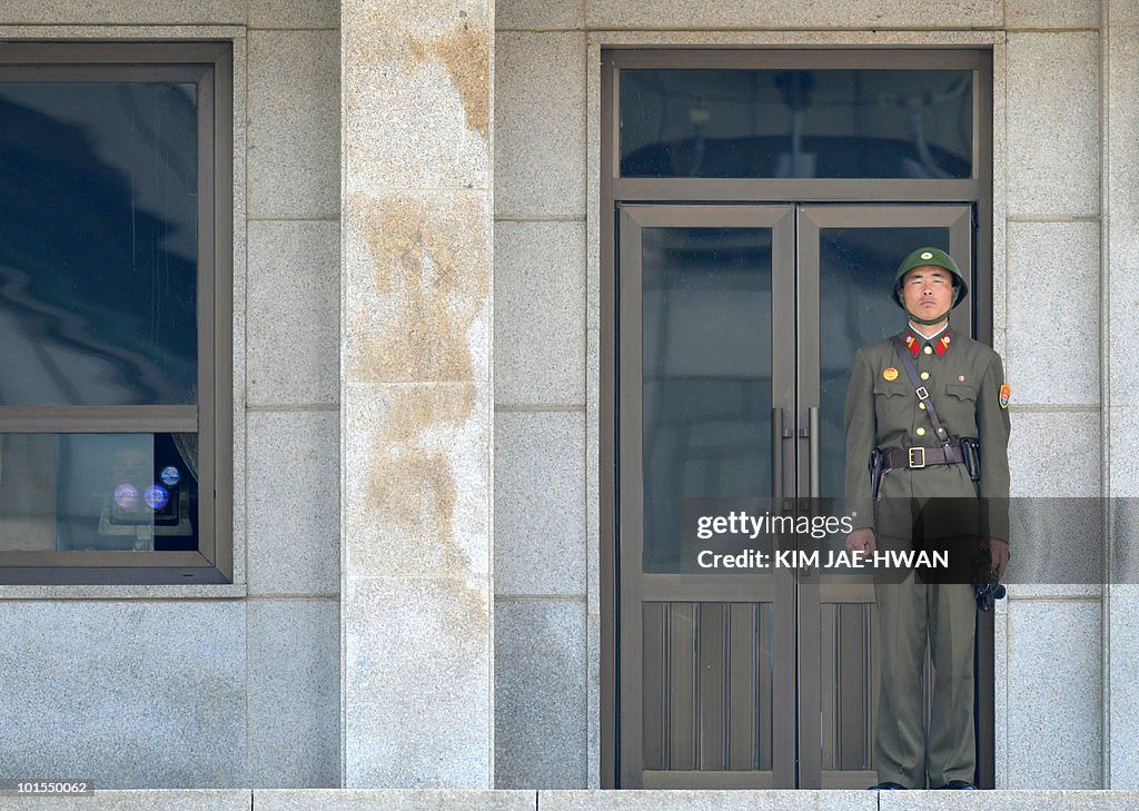 A North Korean soldier keeps watch over