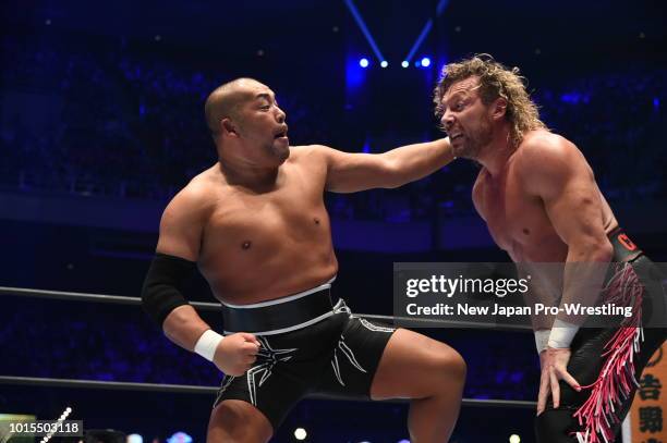 Kenny Omega and Tomohiro Ishii compete in the 6-man tag match during the New Japan Pro-Wrestling G1 Climax 28 at Nippon Budokan on August 12, 2018 in...
