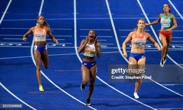 Dina Asher-Smith of Great Britain wins gold in the Women's 200m final during day five of the 24th European Athletics Championships at Olympiastadion...