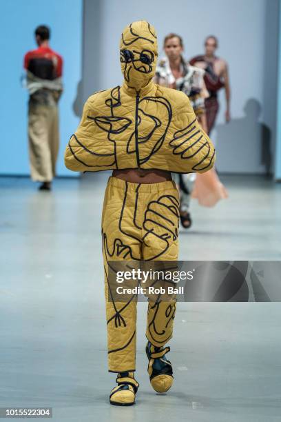 Model on the runway for Domatas Smaizys during the Future of Fashion Show during Copenhagen Fashion Week Spring/Summer 2019 on August 8, 2018 in...