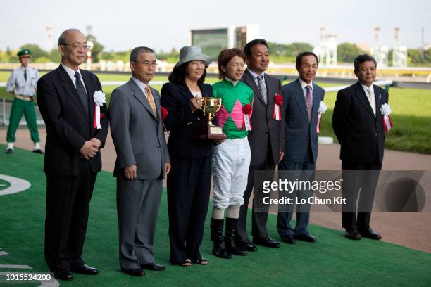 Jockey Masami Matsuoka, trainer Yasuo Ikee , owner Mieko Satomi celebrate after Birdie Birdie winning the Race 12 Unicorn Stakes at Tokyo Racecourse...