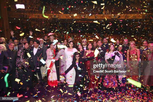 Guests including Rani Mukherjee, Malaika Aror and Freida Pinto pose for a photo as confetti falls at the conclusion of the Westpac IFFM Awards Night...