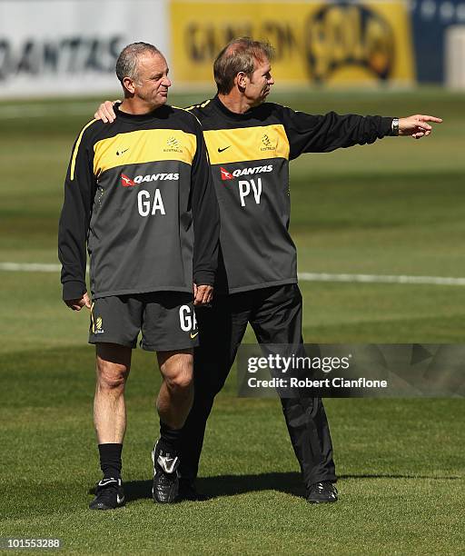 Australian coach Pim Verbeek talks with assistant coach Graham Arnold during an Australian Socceroos training session at St Stithians College on June...