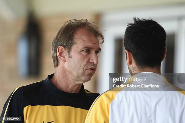 Rhys Williams of Australia talks with coach Pim Verbeek after an Australian Socceroos training session at St Stithians College on June 2, 2010 in...