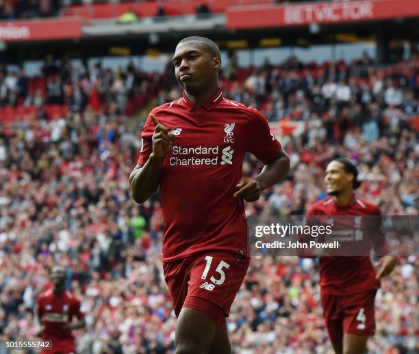 Daniel Sturridge of Liverpool celebrates after scoring the fourth goal during the Premier League match between Liverpool FC and West Ham United at...