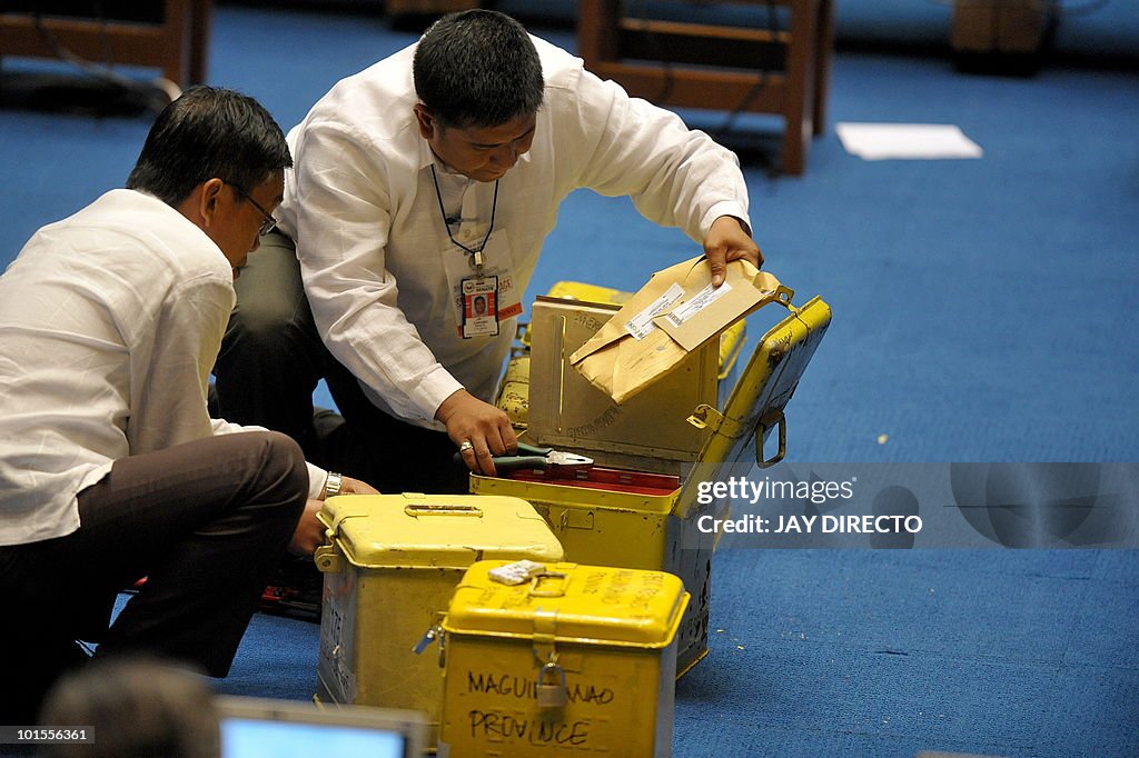 An official removes a certificate from a