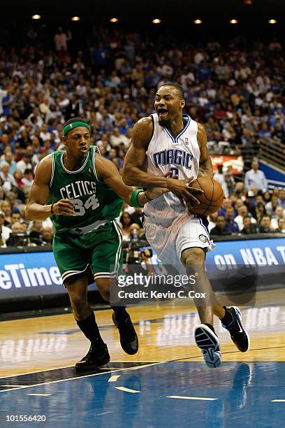 Rashard Lewis of the Orlando Magic drives against Paul Pierce of the Boston Celtics in Game Five of the Eastern Conference Finals during the 2010 NBA...