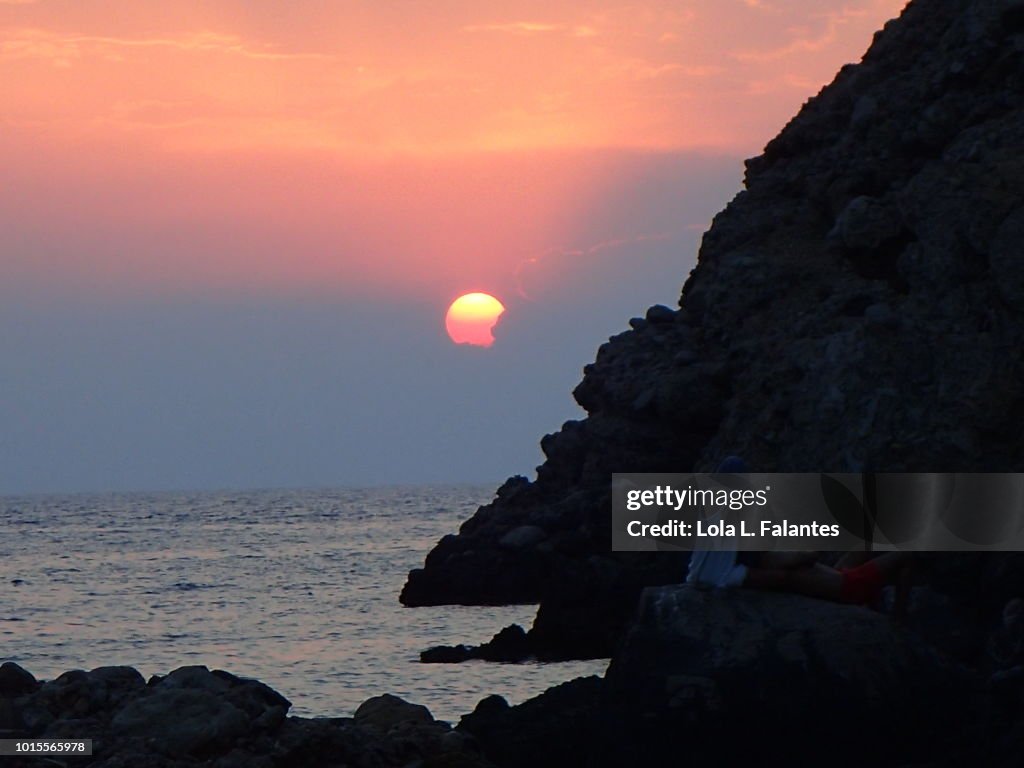 Sunset in cala Benirras, Ibiza Island, Spain