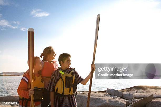woman with sons getting ready to kayak - vinalhaven bildbanksfoton och bilder