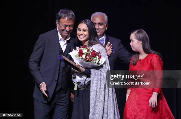 Rani Mukherjee is congratulated by Rajkumar Hirani after winning the Westpac Best Actress Award during the Westpac 2018 Indian Film Festival of...