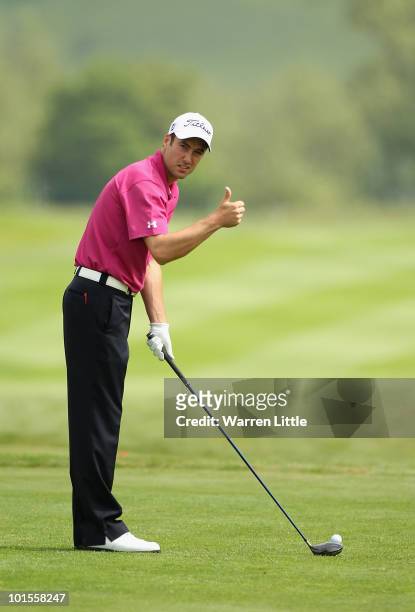 Ross Fisher of England signals to the camera during the Pro-Am for the Celtic Manor Wales Open on The Twenty Ten Course on June 2, 2010 in Newport,...