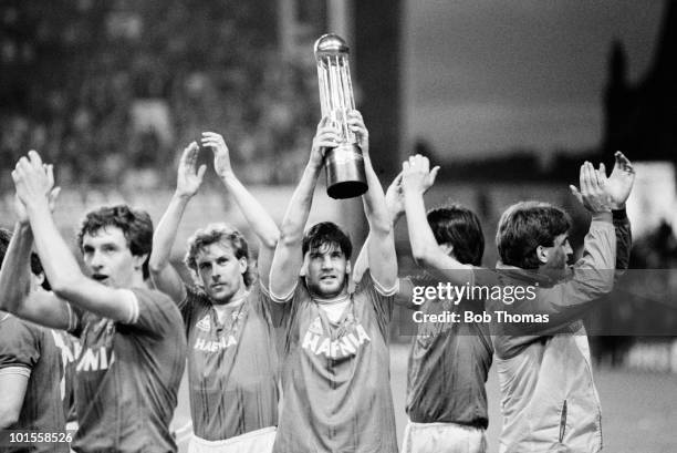 Paul Bracewell of Everton holds aloft the Football League Division 1 Championship trophy following the Everton v West Ham United Division 1 match...