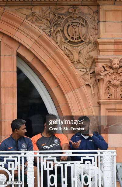 India captain Virat Kohli chats with coach Ravi Shastri on the dressing room balcony during day 4 of the Second Test Match between England and India...