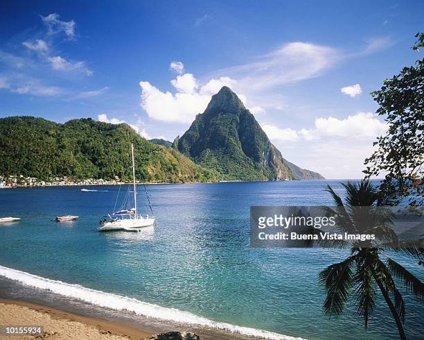 sailing boat in the bay of soufriere - saint lucia stock pictures, royalty-free photos & images