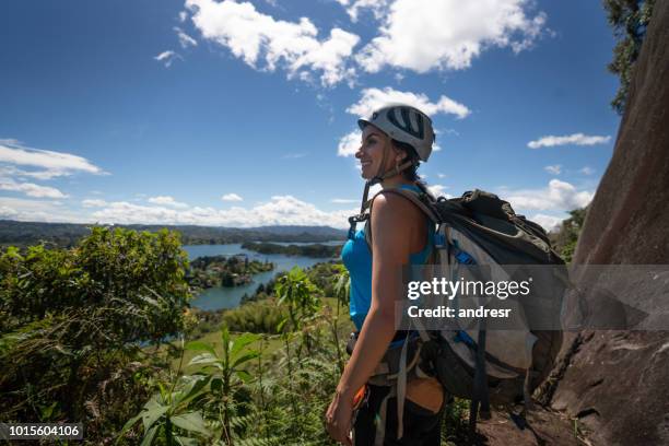 hiker looking at the view from a cliff - antioquia stock pictures, royalty-free photos & images