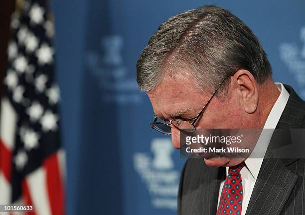 Former U.S. Attorney General John Ashcroft looks at his notes as he speaks at the Heritage Foundation on June 2, 2010 in Washington, DC. Ashcroft...