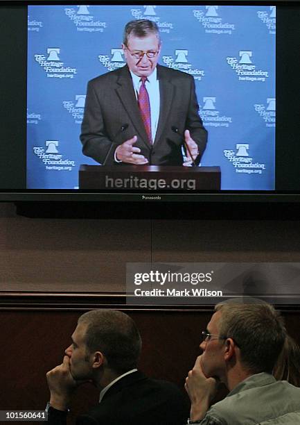 Former U.S. Attorney General John Ashcroft is shown on a monitor as he speaks at the Heritage Foundation on June 2, 2010 in Washington, DC. Ashcroft...