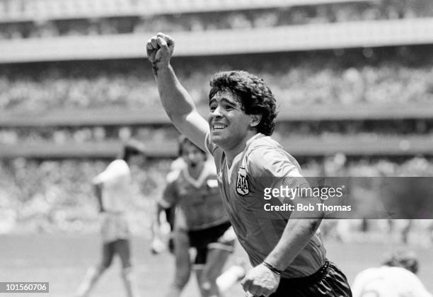 Diego Maradona of Argentina celebrates after scoring the second goal against England during a World Cup Quarter-Final match held at the Azteca...