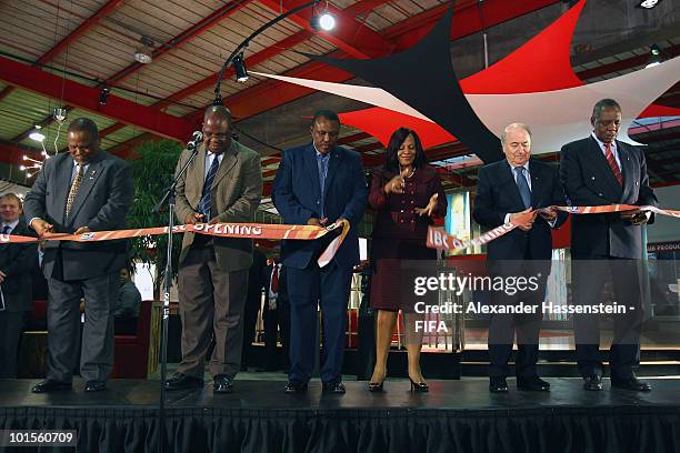 President Joseph S. Blatter cuts the ribbon with Nomvula Mokonyane , Premier of Gauteng, Issa Hayatou , CAF President and Chairman of the FIFA World...