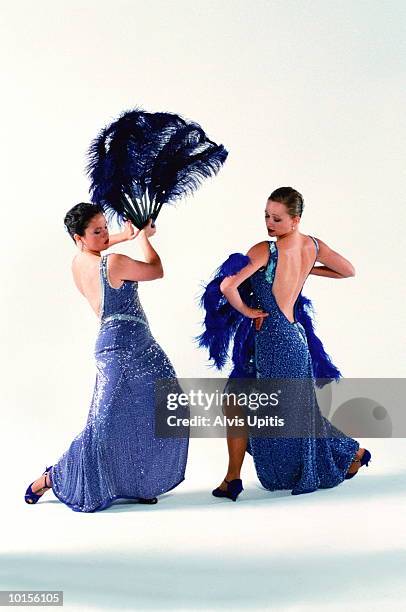dancers - feather fan stock pictures, royalty-free photos & images