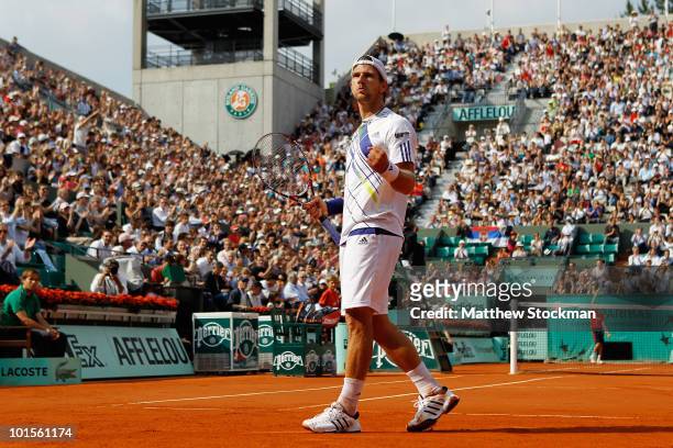 Jurgen Melzer of Austria celebrates during the men's singles quarter final match between Novak Djokovic of Serbia and Jurgen Melzer of Austria at the...