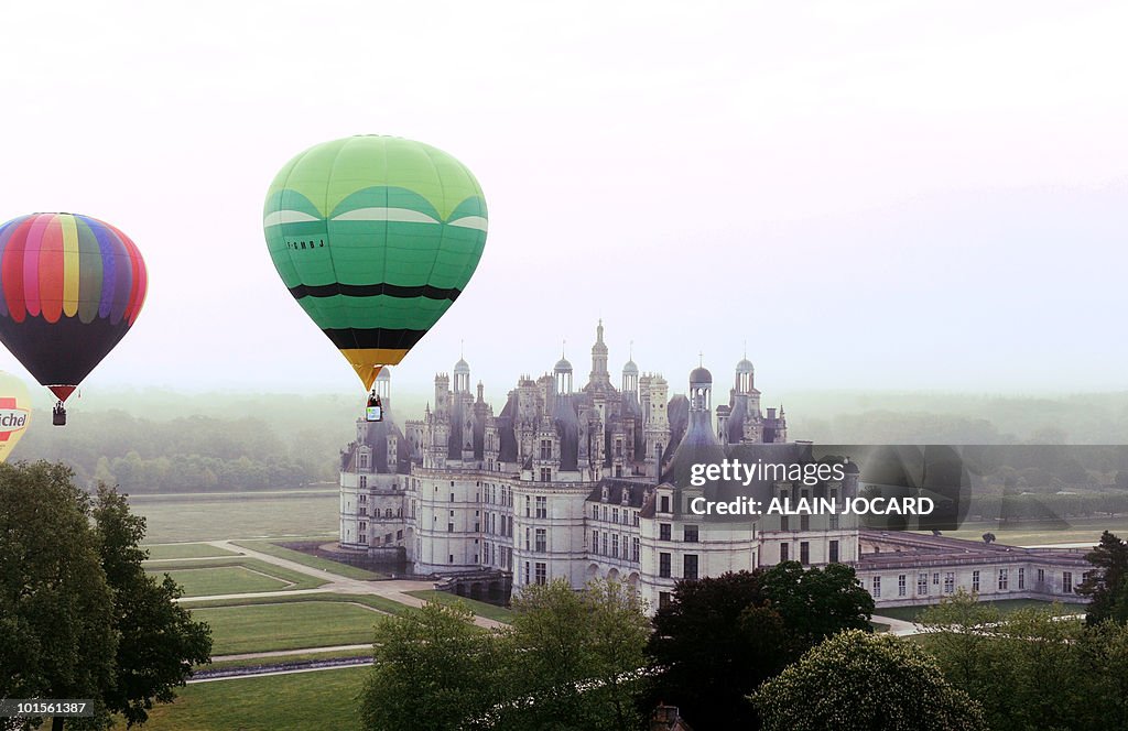 Hot air-balloons fly above the French Re