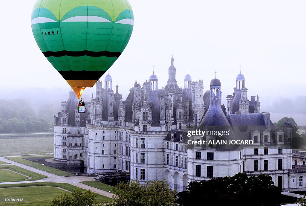 A hot air-balloon flies above the French