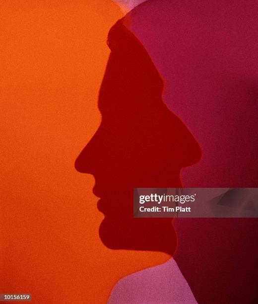 overlapping silhouette profiles - talking head stock-fotos und bilder