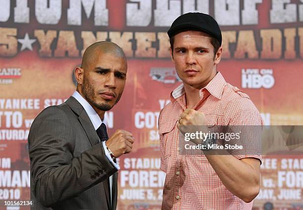 Miguel Cotto and Yuri Foreman poses for a photo during a press conference on June 2, 2010 at Yankee Stadium in the Bronx borough of New York City.