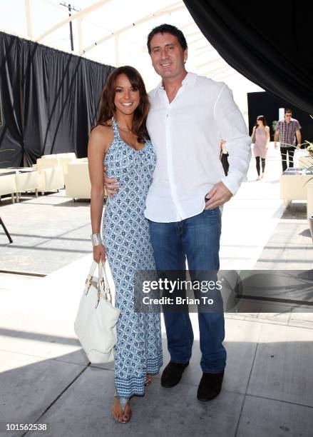 Eva LaRue and fiance Joe Cappuccio attend the ''Unveiled: Bridal Style Revealed'' collection showcase at Melrose Place on March 28, 2010 in Los...