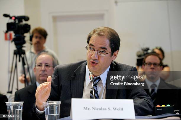 Nicolas Weill, group managing director at Moody's Investors Service, testifies at a hearing of the Financial Crisis Inquiry Commission in New York,...
