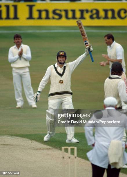 Mark Taylor of Australia acknowledges the crowd after completing his maiden Test century on the second day of the 1st Test match between England and...
