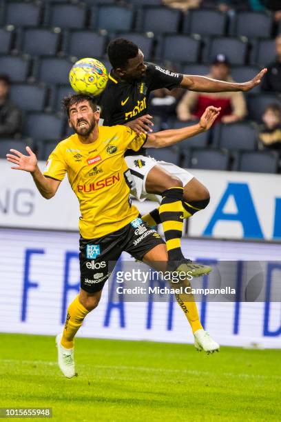 Heradi Rashidi of AIK fights for the ball with Fredrik Holst of IF Elfsborg during an Allsvenskan match between AIK and IF Elfsborg at Friends Arena...