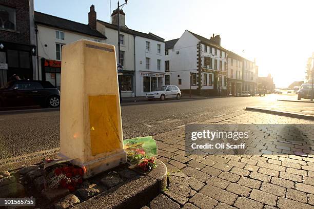 Floral tributes lie at the scene of a murder caused by gunman Derrick Bird on June 2, 2010 in Whitehaven, England. 12 people have been shot dead and...