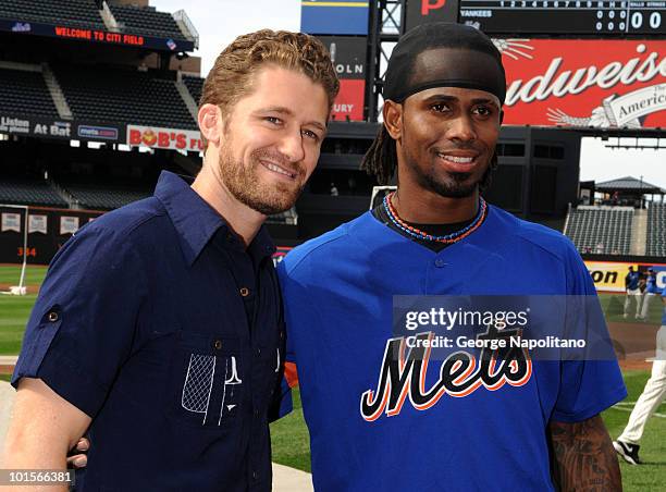 Actor Michael Morrison poses with Jose Reyes of the NY Mets during a visit to Citi Field on May 22, 2010 in New York City.