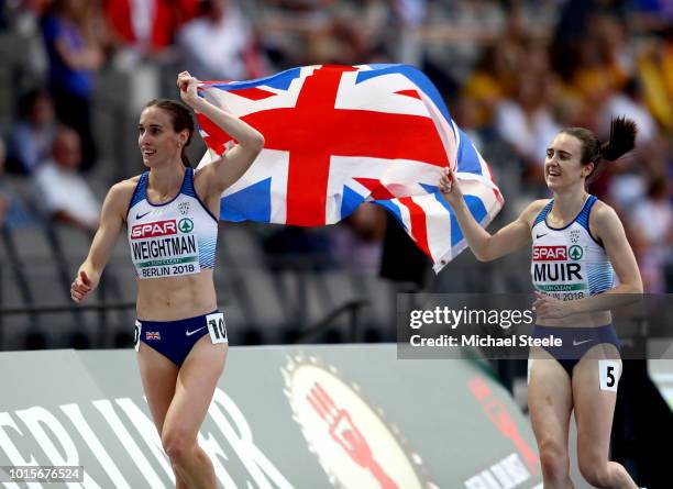 Gold medalist Laura Muir and bronze medalist Laura Weightman of Great Britain celebrate after wining their respective medals in the Women's 1,500m...