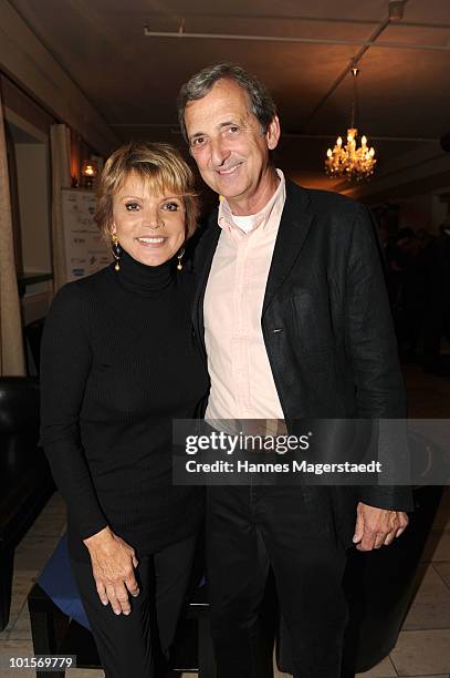 Actress Uschi Glas and husband Dieter Hermann attend the premiere of 'Puppenspiel' at the Forum Kino on June 2, 2010 in Munich, Germany.