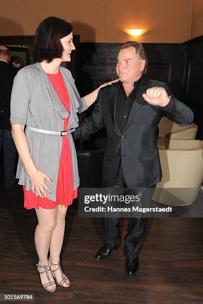 Actress Susanne Kellermann and Fritz Wepper attend the premiere of 'Puppenspiel' at the Forum Kino on June 2, 2010 in Munich, Germany.