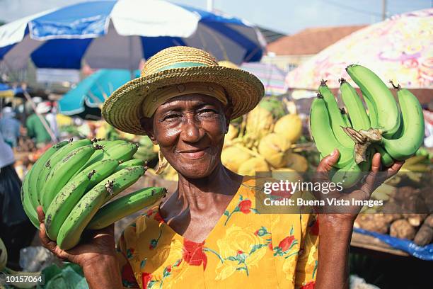 local woman vendor, saturday market - caribbean culture stock pictures, royalty-free photos & images