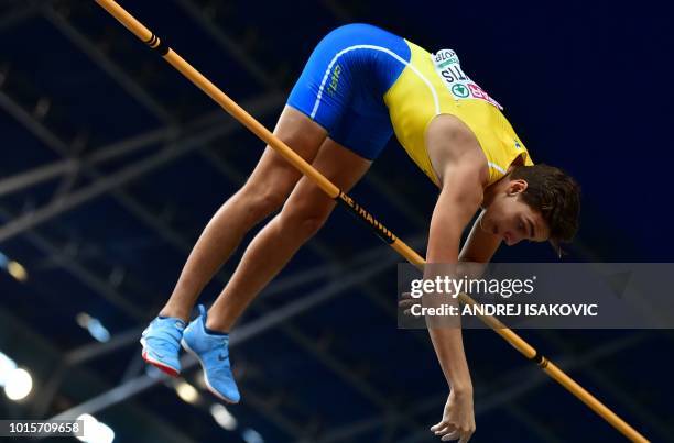Sweden's Armand Duplantis competes to win the men's Pole Vault final during the European Athletics Championships at the Olympic stadium in Berlin on...