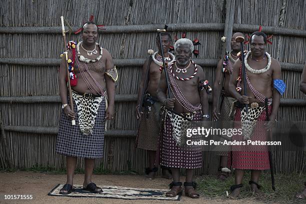 King Mswati III and members of the royal family poses for a picture at a traditional Reed dance ceremony at the stadium at the Royal Palace on August...