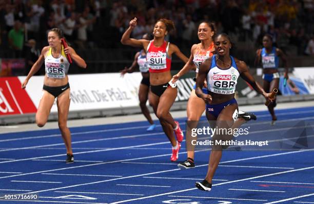 Dina Asher-Smith of Great Britain crosses the line to win gold in the Women's 4 x 100m Relay Final during day six of the 24th European Athletics...