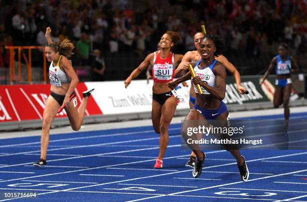 Dina Asher-Smith of Great Britain crosses the line to win gold in the Women's 4 x 100m Relay Final during day six of the 24th European Athletics...