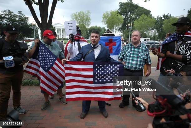 Jason Kessler , who organized the rally, speaks as white supremacists, neo-Nazis, members of the Ku Klux Klan and other hate groups gather for the...