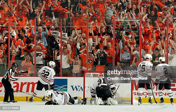 The Philadelphia Flyers fan cheer after Daniel Briere scores a first period goal against the Chicago Blackhawks during Game Three of the 2010 NHL...