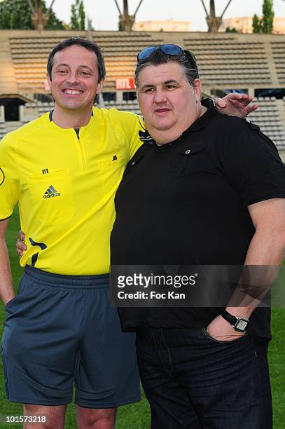 Arbitrator Alain Sars and TV journalist Pierre Menes attend the World Charity Soccer Charity Match For Haiti at the Stade Charlety on May 19, 2010 in...