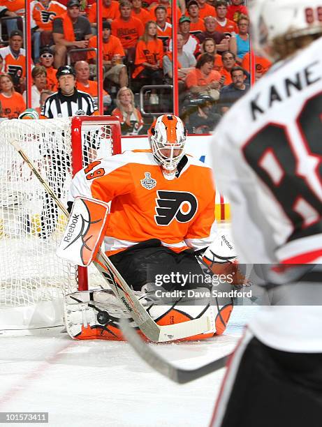 Goaltender Michael Leighton of the Philadelphia Flyers makes a save from a shot from Patrick Kane during the first period of Game Three of the 2010...