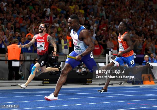 Harry Aiknes-Aryeetey of Great Britain celebrates winning the gold medal in the Men's 4 x 100m Relay Final during day six of the 24th European...